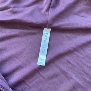 Nice soft material, stretchy, in a mauve/purple color